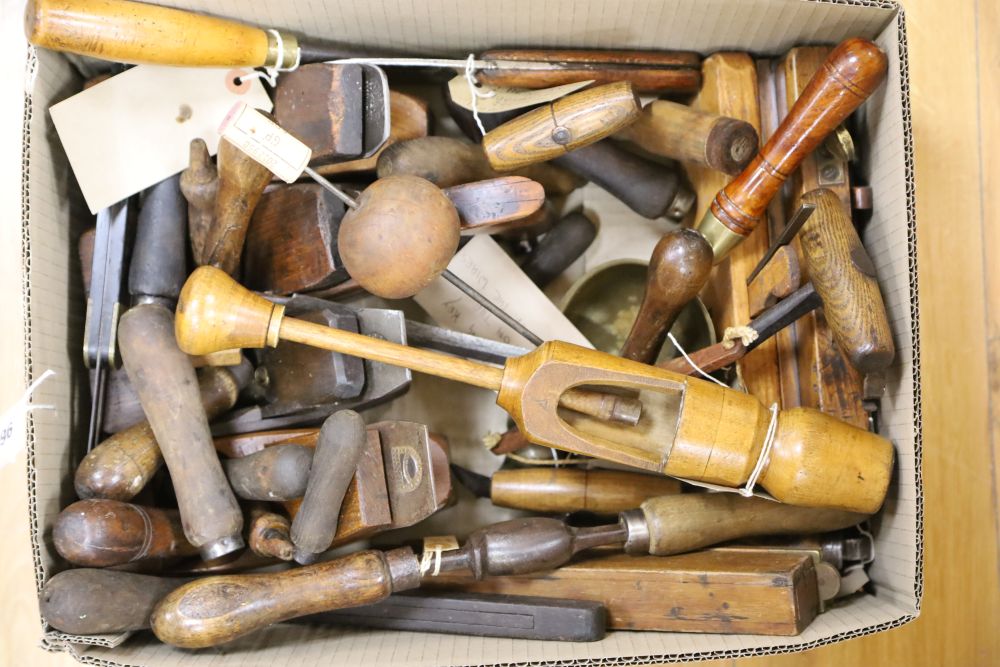 A quantity of assorted hand tools including a bale grabber, a hop poke lifter, brass corn scoops, etc.